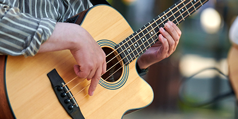 man playing a guitar